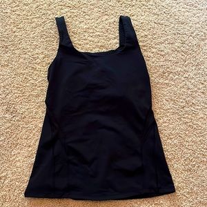 Lululemon Tank top. adjustable waist. Mesh cross back detail.